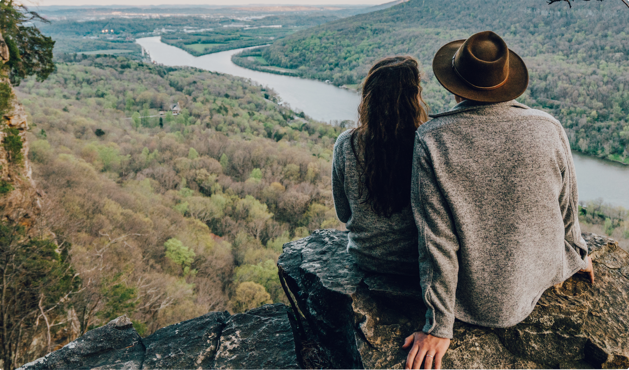 Couple looking out over the river