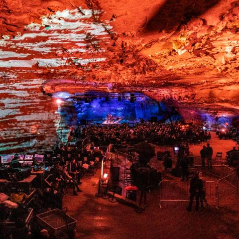 Fossil ceilings, limestone walls,  The music starts when evening falls, Ancient rock echoes modern sounds, In the cool, dark underground. Written about The Caverns in Pelham, Tennessee.