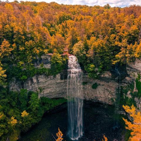Tennessee waterfall with orange foliage in background