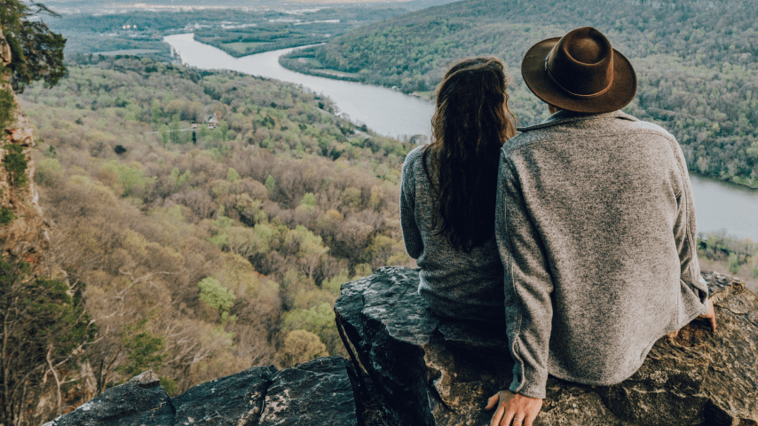 Couple looking out over the river